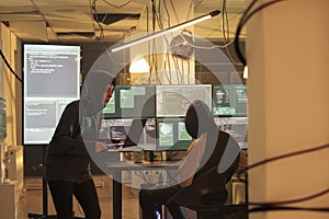 Hackers coding spyware, cracking database password, data breach