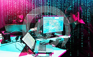 Hackers are breaking server using computers. Cybercrime concept.