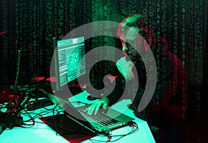 Hacker is breaking server using computers. Cybercrime concept.