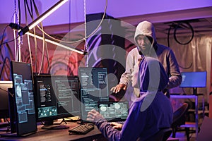 Hackers working together and coding