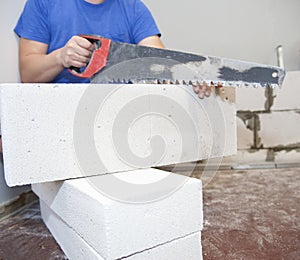 Hacksaw for aerated concrete. The cutout of the doorway in the wall from the gas block is handmade.