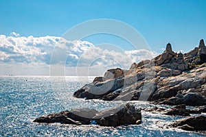 Haedong Yonggungsa Temple stone tower and blue sea in Busan, Korea