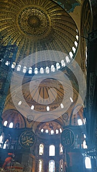 Hagia Sophia domes and minarets in the old town of Istanbul, Turkey, on sunset