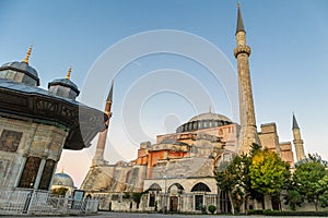 Hagia Sophia domes and minarets in the old town of Istanbul, Turkey, at sunrise. photo