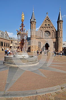 The Ridderzaal Knight`s Hall, which forms the center of the Binnenhof 13 century gothic castle, with the neo-gothic fountain