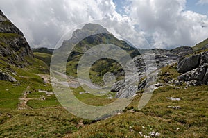 Haidachstellwand peak in Rofan Alps with cloudy sky, The Brandenberg Alps, Austria, Europe photo