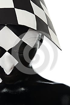 Haif face with a chessboard on the head
