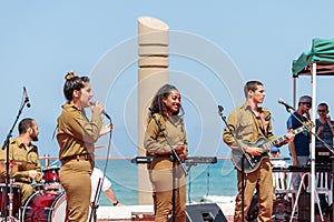 Members of the Army Music Group perform in the city of Haifa in honor of the 70th anniversary of the independence of the State of