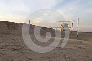 Volleyball net and lifeguard booth at Dado beach photo