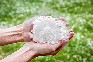 Hail in hands. Hailstorm