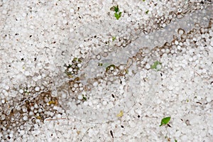 Hail, mud and water on the ground after a hurricane