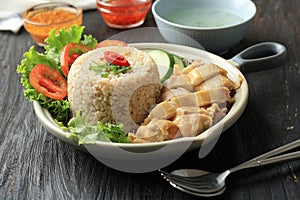 Hainan Chicken Rice with Chicken Stock Soup, Garlic Oil, and Spicy Sambal