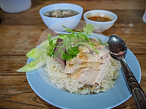Hainanese chicken rice , Thai gourmet steamed chicken with rice, bean sauce and soup