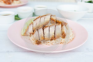 Hainanese rice with crispy pork , Thai gourmet steamed crispy po