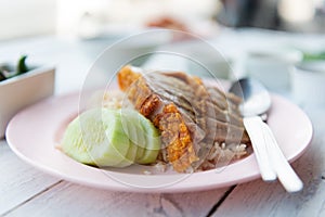 Hainanese rice with crispy pork , Thai gourmet steamed crispy po