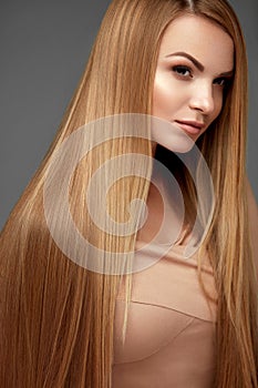 Hair Beauty. Beautiful Woman With Healthy Long Straight Hair