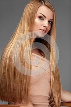 Hair Beauty. Beautiful Woman With Healthy Long Straight Hair