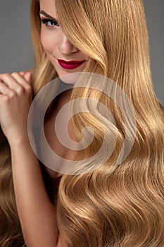 Hair Beauty. Beautiful Woman With Makeup And Long Blonde Hair