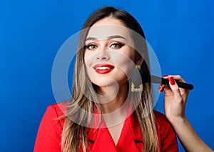 Hair beauty and hairdresser salon. beauty and fashion. Fashion portrait of woman. jewelry earrings. Girl in red jacket