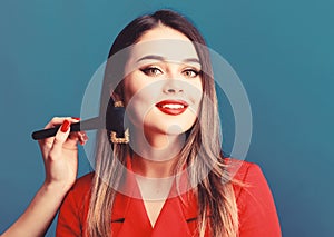 Hair beauty and hairdresser salon. beauty and fashion. Fashion portrait of woman. jewelry earrings. Girl in red jacket