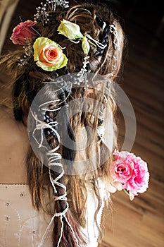 Hair of bride with flowers and beads