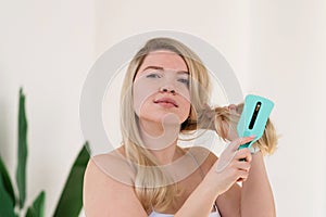 Hair brushing as part of morning routine