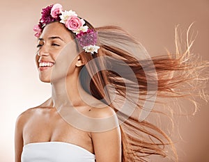 Hair care, beauty and flower crown on woman for cosmetics, floral and natural skin on studio background. Headshot of