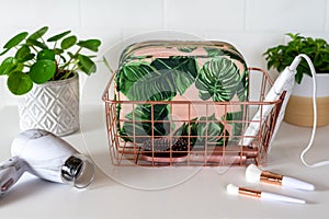 Personal care and beauty products in a wire basket