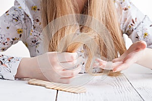 Hair Care. Closeup Of Beautiful Woman Hairbrushing Hair With Brush. Portrait Of Female Woman Brushing Long Straight Healthy