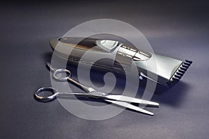 Hair clipper gray shine non power lines with a chrome haircut scissors