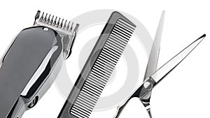 Hair clipper, Scissors, comb. Professional barber hair clipper and shears for Men haircut. Hairdresser salon equipment