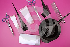 Hair coloring kit, hairdressing tools, brushes and a bowl for mixing paints and pigments