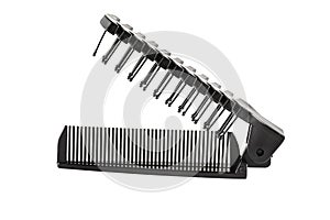 Hair Comb. Sisir lipat. Black double sided folded comb, made by plastic, for travelling, isolated on white background. Close-up