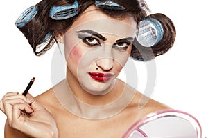 Hair curlers and bad make up