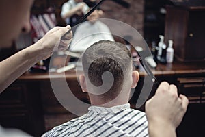 Hair cutting head scissors. Men`s hairdresser