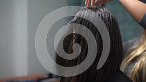 Hair drying for young middle eastern girl, lon black hair, close up portrait shot