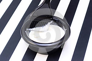 hair dye in a bowl with a brush