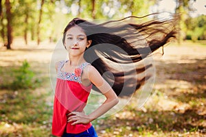 Hair of girl hair is blowing in the wind