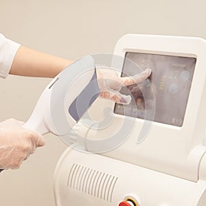 Hair laser removal service. IPL cosmetology device. Professional apparatus. Woman soft skin care