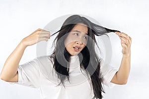 Hair loss, crisis and worried woman in studio for beauty, messy and damage against white background