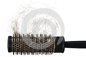 Hair loss problem with round hair brush , isolated on white background. horizontal frame