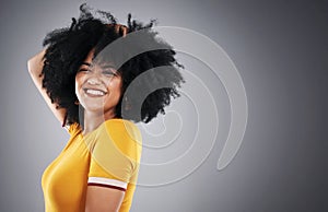 Hair, mockup and portrait of happy woman in studio for afro care, shampoo or curly mousse results on grey background