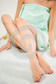 Hair Removal Concept. Beautiful Woman Hand Touching Long Legs photo