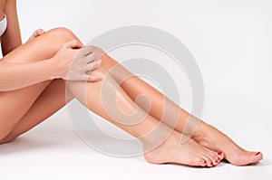 Hair removal and epilation. Woman legs with smooth skin after depilation.