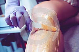 Hair removal with wax. Shugaring. Wax depilation.