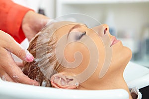 Hair salon. Washing with shampoo.