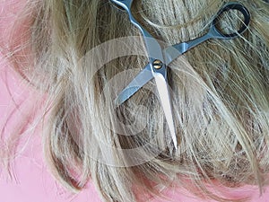 Hair scissors background brown, concept wig, hairdressing
