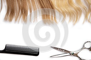 Hair scissors comb on a white background place for text. The concept of hairdressing