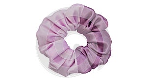 Hair tie or hair scrunchie made out of satin fabric with beautiful texture