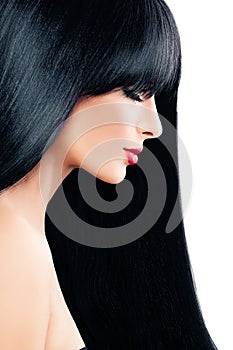 Haircare Concept. Beautiful Brunette Woman with Black Hair